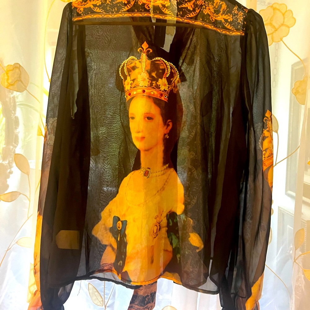 ‘ Crowned’ sheer blouse.